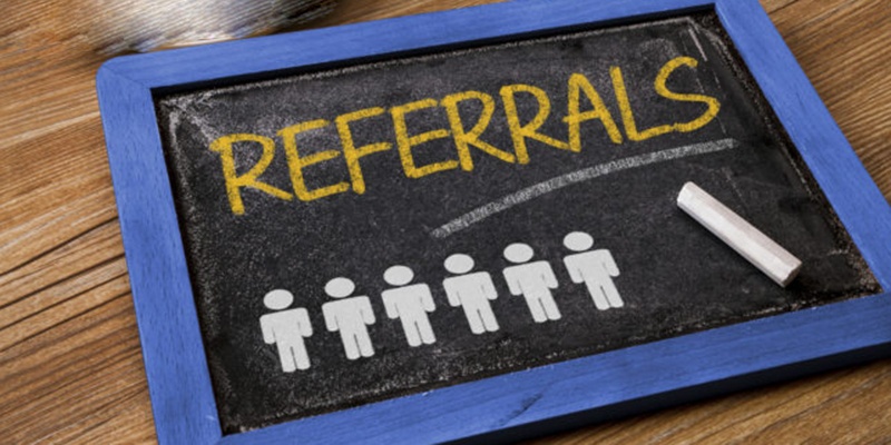 referrals concept handwritten on blackboard